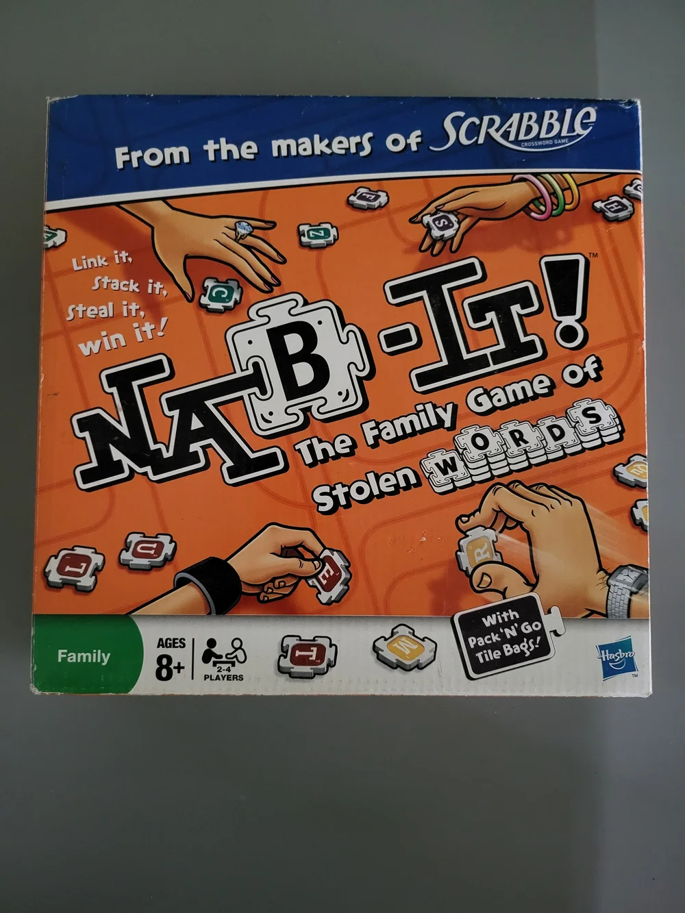 Hasbro Nab-It! Family Word Game - Orange Box with Blue Header